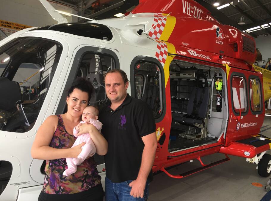 Giving back: In 2017 Rachel and her husband Chris met the Westpac Rescue Helicopter Service pilot who rescued her. Now she raises funds for the organisation. Photo: supplied.