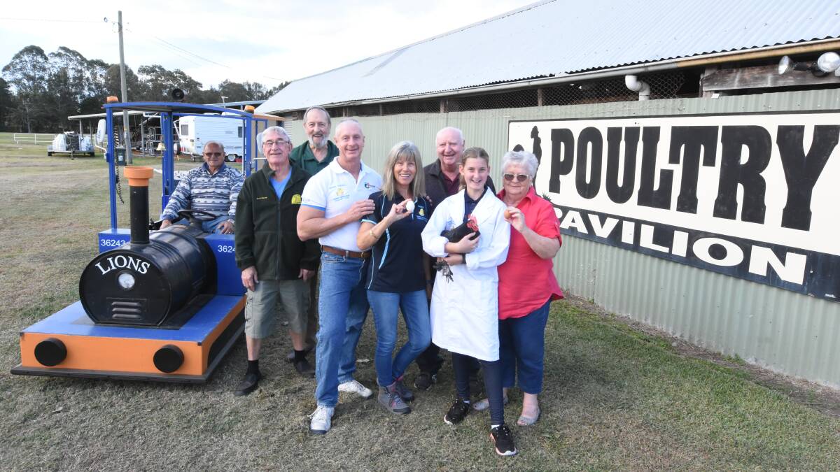 Hans Rooimans (Manning River Lions Club), Allan Poulton and Peter Kinsella (Manning Valley Woodworkers), and Peter, Sandy, Barry, Katie and Aileen Tisdell. Photo: Scott Calvin