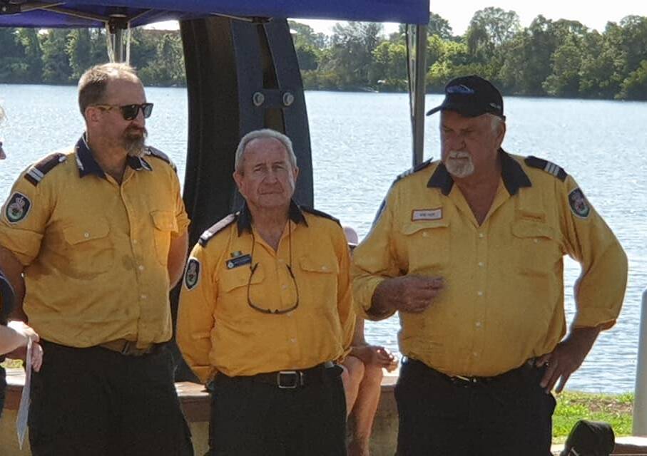 Past and present: The Wallaby Joe brigade was awarded Community Group of the Year at the Taree 2020 Australia Day Awards. Pictured at the awards are then captain Bob Pope (right) and present captain Kristian Guppy (left) with president John Dorrington. Photo: supplied