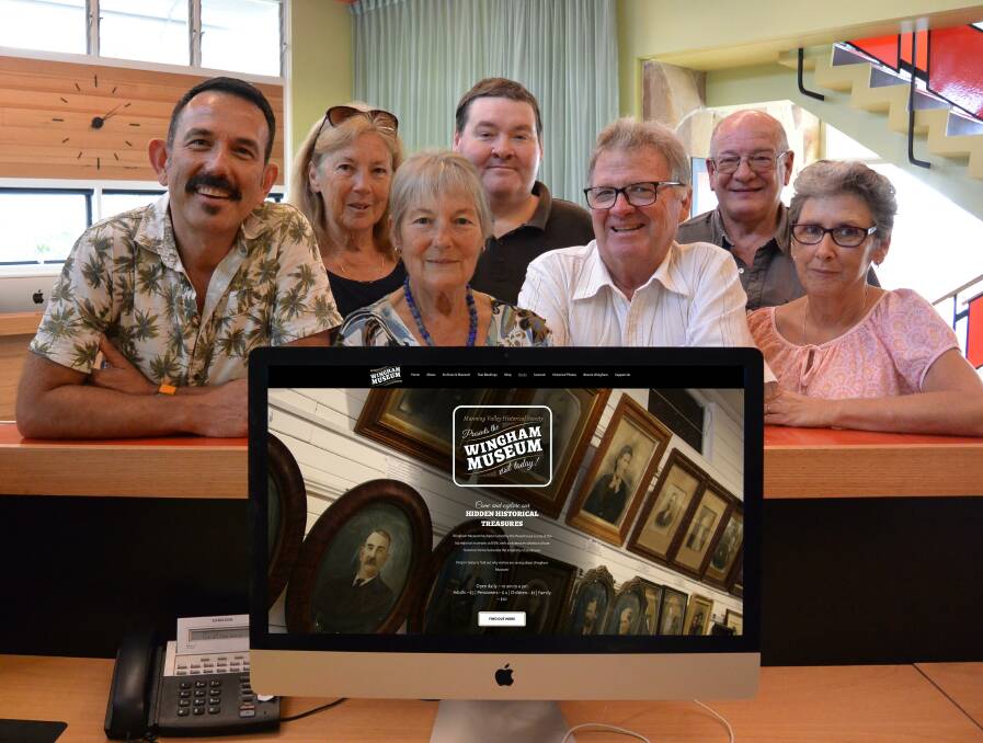 Well Creative's Aaron Cuneo with Wingham Museum volunteers, Kaye Wallace, Judy Yarrington, Manning Valley Historical Society treasurer Scott Grant, president Neal Greenaway, museum curator Terry Tournoff and volunteer Robyn Greenaway, Photo: Julia Driscoll