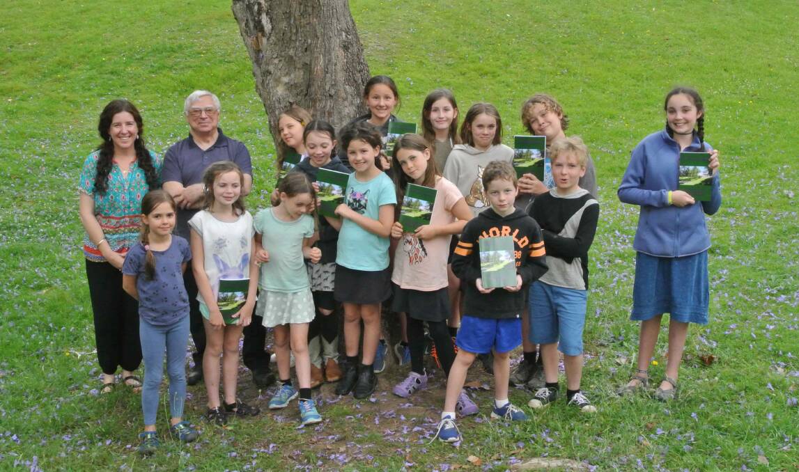 Classroom teacher Sarah Parker and author Michael Davies with the student-authors of Bobin Public School. Photo: submitted