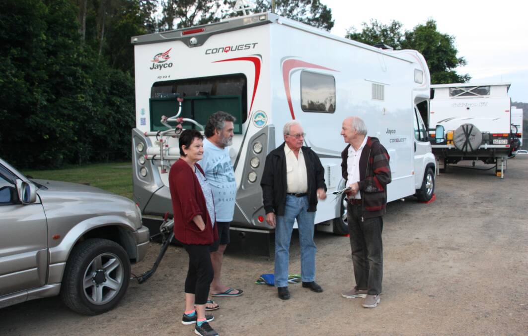 Wingham welcome: WAG member Ron Sky sharing local information with Trevor from the Gold Coast, and Darryl and Gail from the Sunshine Coast in Queensland, enjoying an overnight stay at Wingham's Riverside Reserve. Photo: supplied