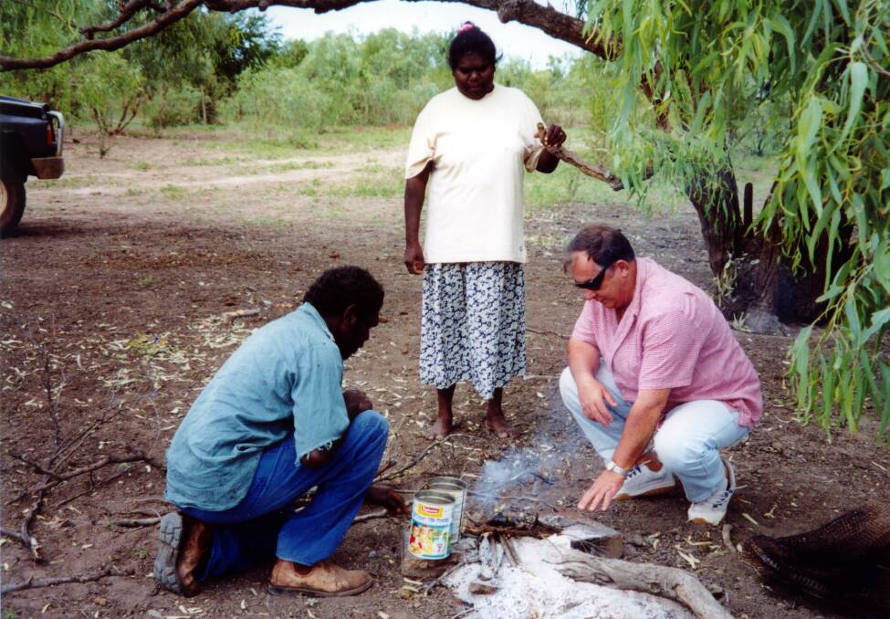 In the field: Rev Trevor Leggott OAM (right) with members of the Marlinja community in the Northern Territory. Photo: supplied