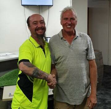 Monthly Medal winner Steve Abbott with Image Smash Repairs sponsor Jason Patrick at Wingham Golf Club.