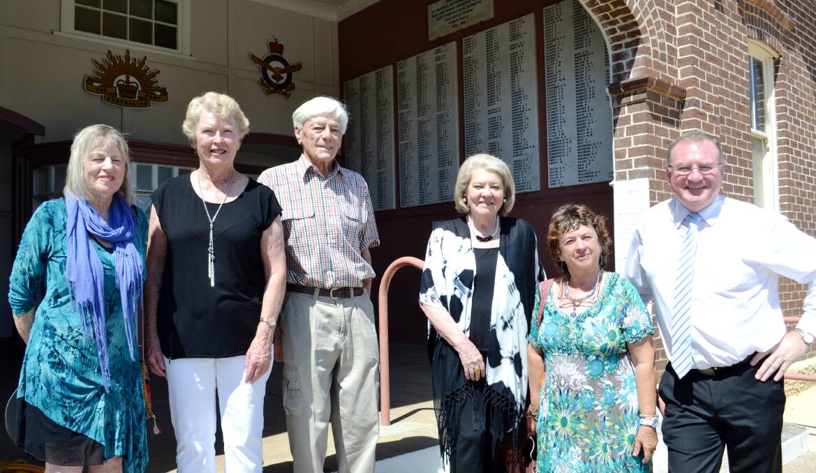Maggie Young, Barbara Waters, Eric Richardson OAM, Mave Richardson AM, Margaret Clark and Member for Myall Lakes Stephen Bromhead in front of the Honour Roll at Wingham Town Hall.