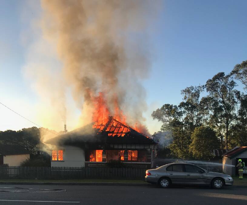 Gutted: The house was well ablaze by the time emergency services were on the scene. Photo: Wingham Fire and Rescue captain David O'Donnell