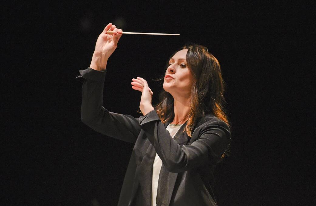 Conducting the Dallas Opera at Winspear Opera House. Photo by Karen Almond