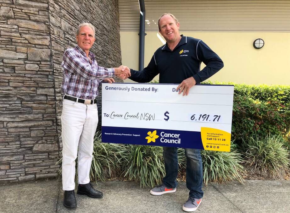 Graham Mansfield presenting the cheque to Tim Chapman, Cancer Councils
Community Programs co-ordinator