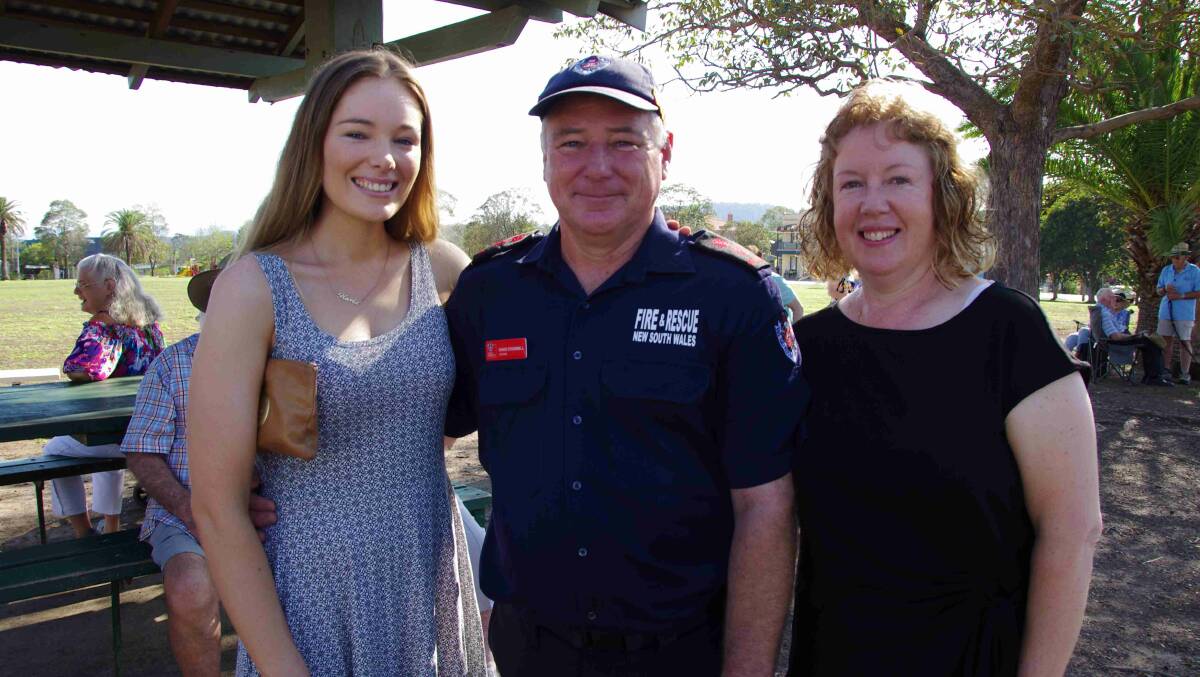 David O'Donnell flanked by his proud family members, daughter Karla and wife Angela, at the Australia Day ceremony in Wingham. Photo: Julia Driscoll