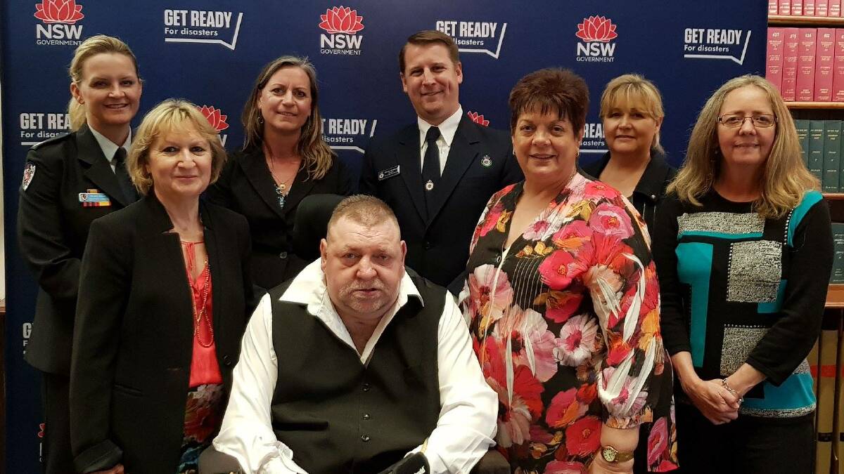 PREPARE NSW team at the NSW Resilient Australia Awards. John Green (seated) with Life Without Barriers, Healthe Care/Mayo Home Nursing and Dundaloo representatives and Michelle Villeneuve (standing behind John Green). Photo: supplied