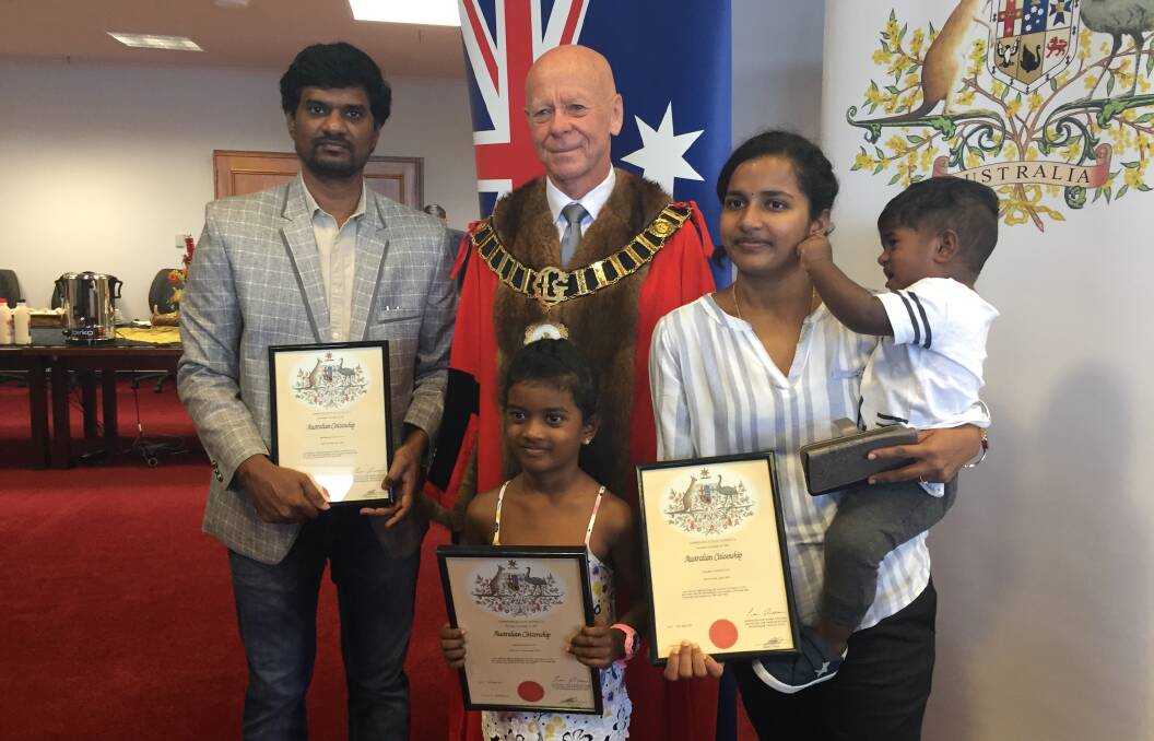 The Edaggotti family are happy new Australian citizens. Pictured with Mayor David West.