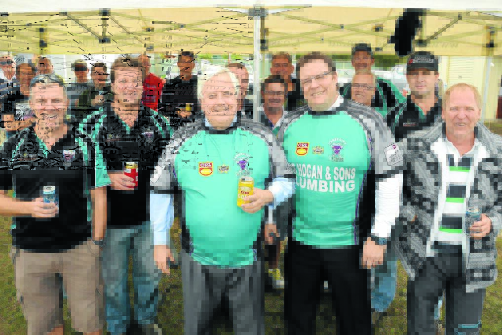Having a beer with Clive: Clive Palmer has a beer with some Taree City supporters last year when he attended a match at the Jack Neal Oval with the then Palmer United Party senate candidate Glenn Lazarus.