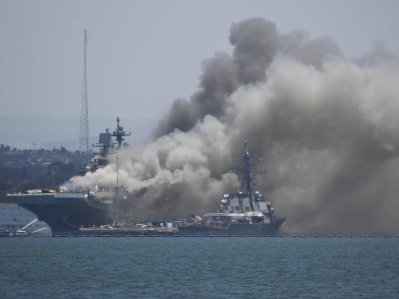 A US military ship has caught fire off San Diego, with 21 people taken to hospital.