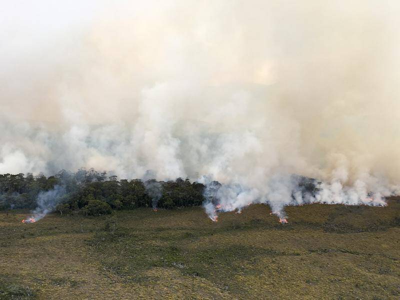 Lives in central Tasmania are at risk as firefighters battle more than 50 blazes across the state.