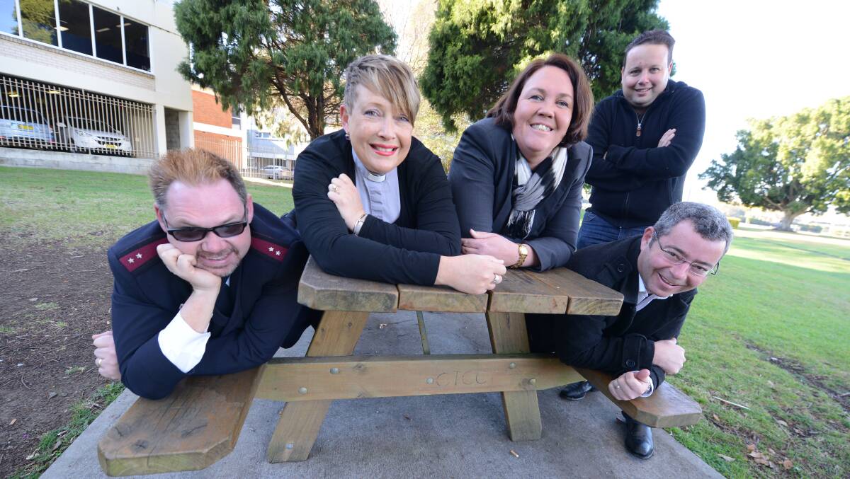 Taree: Mark Williamson, Rev Helen Holliday, Lee Lyons, Tim Doyle and Nathan Cooper practice sleeping outdoors, in readiness for the Homelessness Sleep Out.