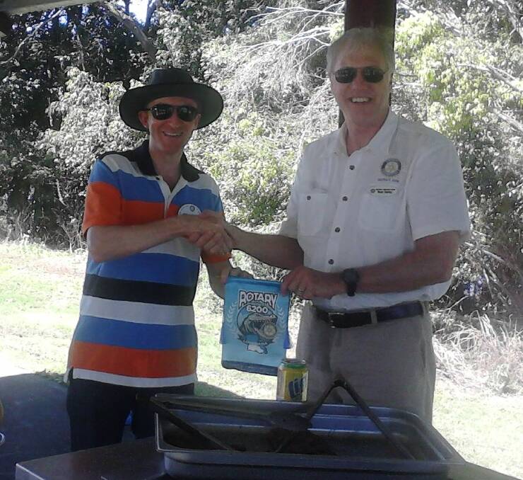 Wingham Rotary president Michael Roohan with Rotary District 6200 Australia Exchange Team leader Mark Shirley