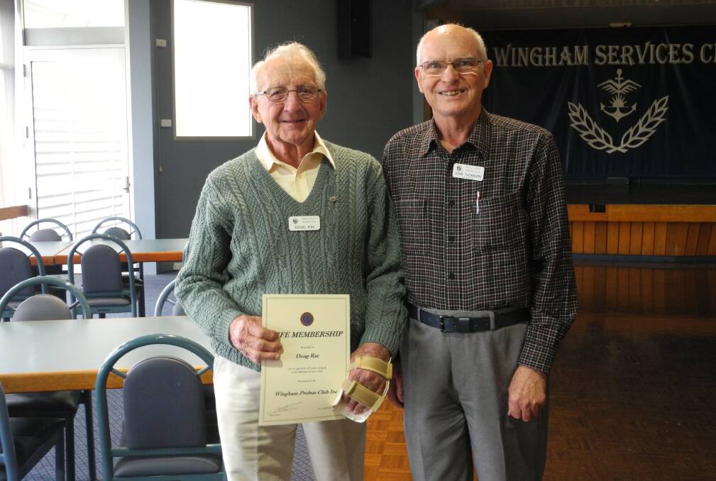New life member of Wingham Probus Club Doug Rae receives the honour from John Thorburn
