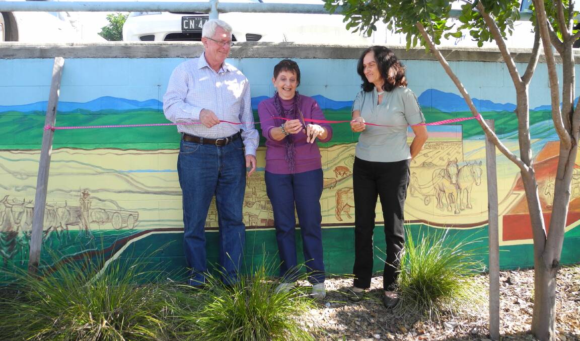 The official opening of the repainted Wingham Plaza Mural