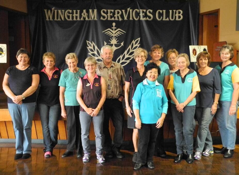 Members of the Mid-North Coast Bootscooters at Wingham Services Club on Monday June 23, 2014