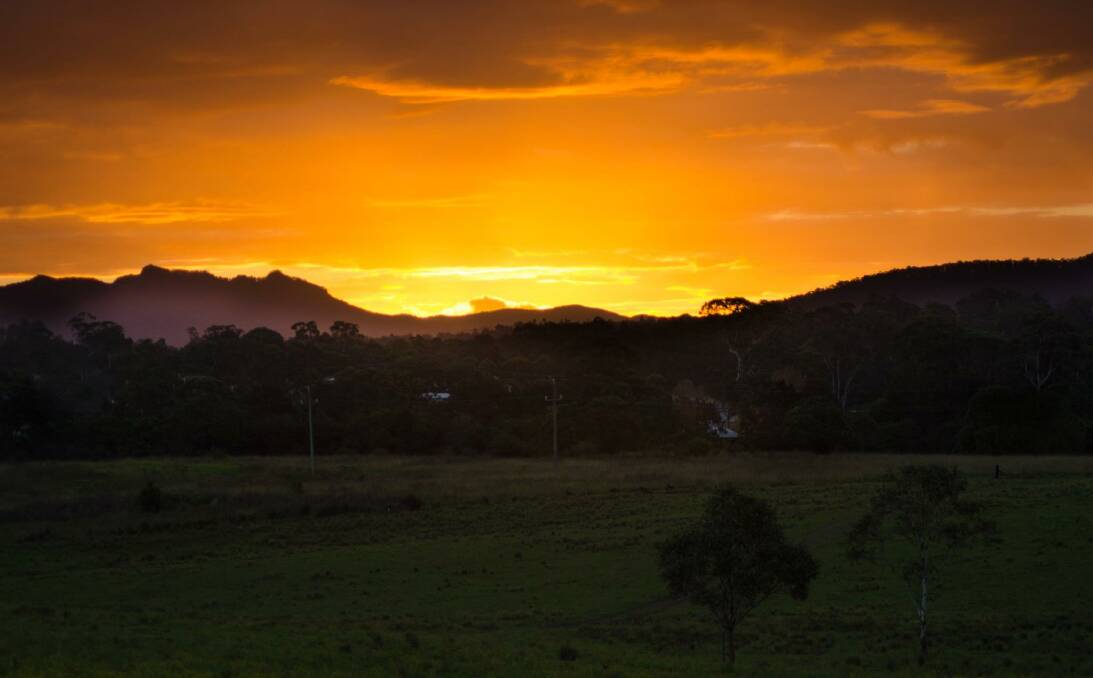 Sunset over the mountains, Wingham. Photo by Sarah Kesby