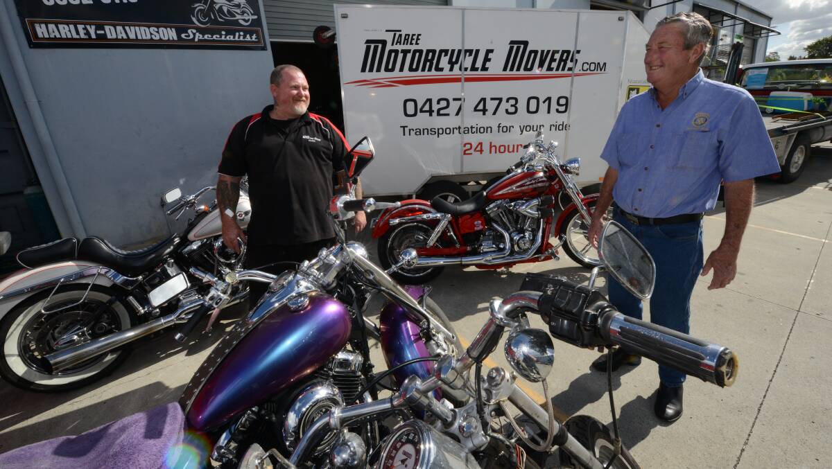 Mark Smith of Taree Motorcycle Movers and Tony Love of the Rotary Club of Wingham discuss the logistics of supporting more than 100 riders in the charity ride.
