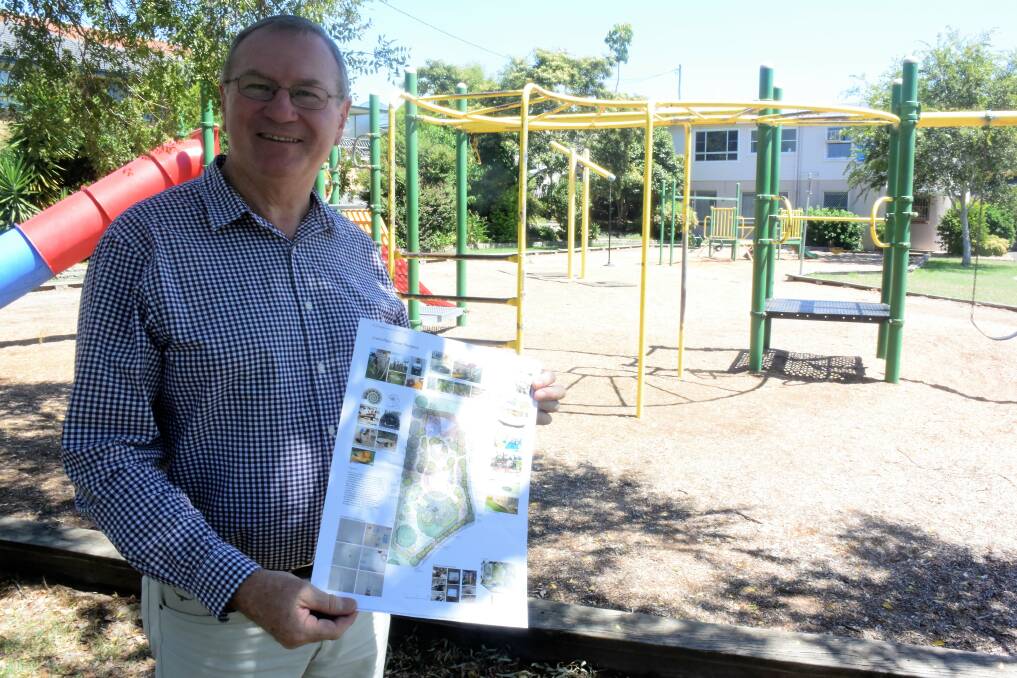 Member for Myall Lakes Stephen Bromhead with the layout for the new playground in Fotheringham Park.