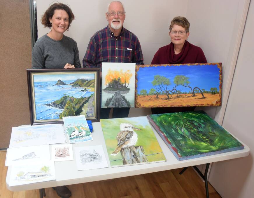 Jillian Oliver, Ron Hindmarsh and Taree Craft Centre's Pam Eyb with some of the art works that will be displayed at the centre. 