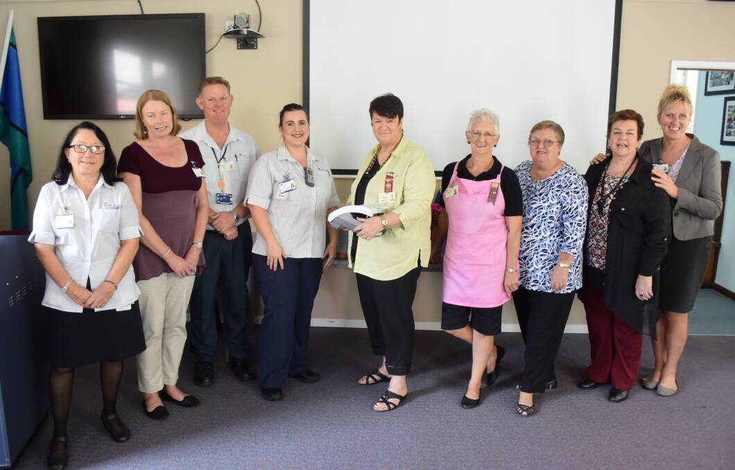 Improved equipment: Judith Modderno, Leanne O'Grady, Colin Keen, Erin Hunt, Pink Ladies president Corinne Lang, Beverly Danilczak, Betty Grant, Denise Jones and Sue Arber were on hand for the presentation. 