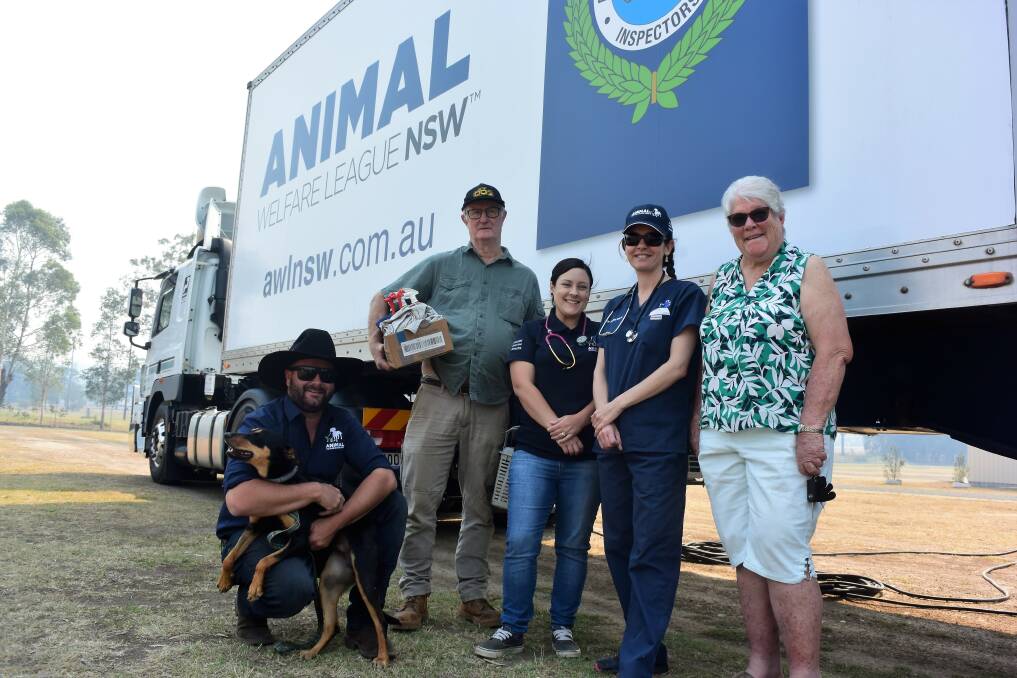 Animal Welfare League NSW's Dan Naethuys, president Dr David Hope, Chloe Crass, Dr Sophie Baron and Manning Great Lakes branch president Marg Steel with the mobile clinic at Taree Showground. Photo: Rob Douglas.