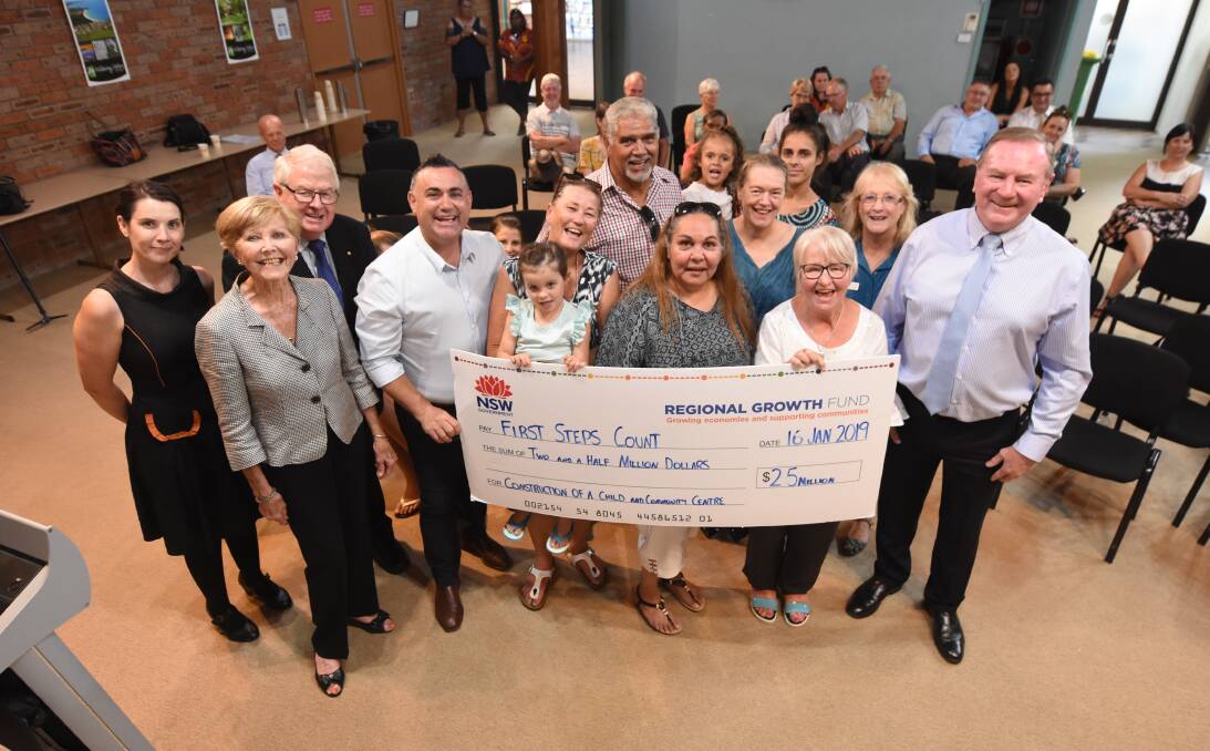 Proud moment: NSW Deputy Premier John Barilaro and Member for Myall Lakes Stephen Bromhead with committee members and supporters of the First Steps Count Child and Community Centre. Photo: Scott Calvin.