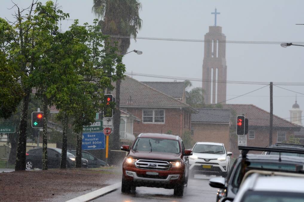 Rain was at times heavy for motorists in the morning commute to Taree on Friday. Photo: Scott Calvin.
