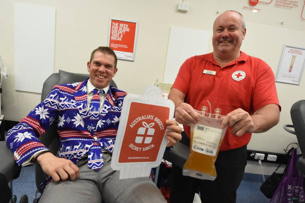 Blood donor Ivor Thomas and Blood Bank spokesperson Stuart Ward encouraged the community to be a Secret Santa this Christmas and donate blood. Photo: Scott Calvin.