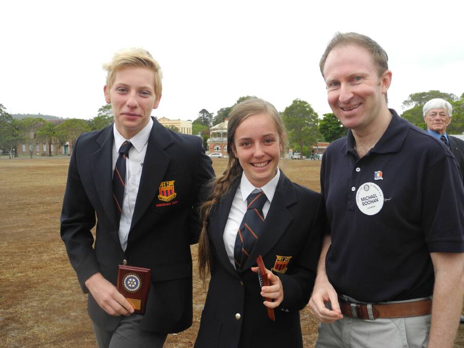 Joel Hedge and Eddi Raglus were both given Young Achiever of the Year Awards presented by Michael Roohan of Rotary (right)