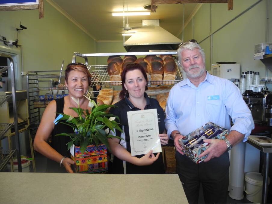 Di Murray (left) and Phil Rees of Wingham Brush Public School with Tracy Potts of Pottsy's Bakehouse 